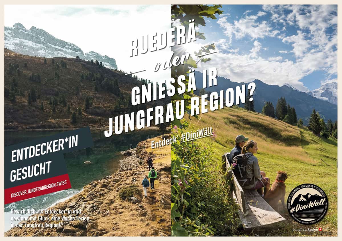 Auf einem Plakat der Kampagne #Dini Wält der Jungfrau-Region steht: «Ruederä oder gniessä ir Jungfrau-Region? Entdecker*in gesucht.» Auf der einen Seite ist der Engstlensee zu sehen, auf der anderen Wanderer auf einer Holzbank.