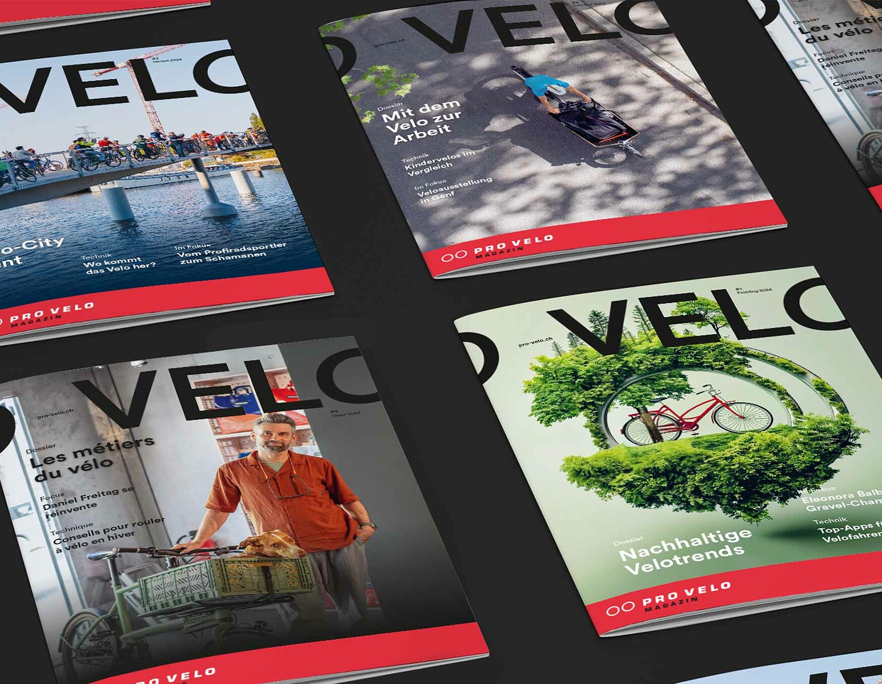 Mehrere deutsche und französische Ausgaben des Pro-Velo-Magazins liegen ausgebreitet nebeneinander.