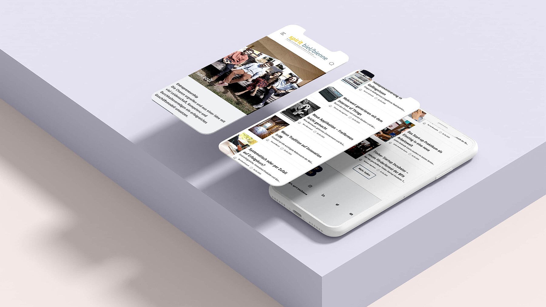Ein Smartphone zeigt die Online-Version des BFH-Magazins «spirit biel/bienne»: Einstiegsseite und Inhaltsübersicht.