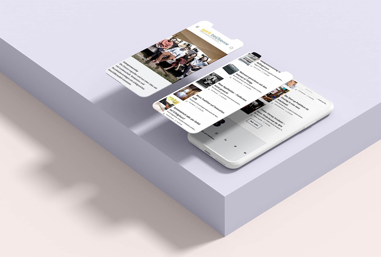 Ein Smartphone zeigt die Online-Version des BFH-Magazins «spirit biel/bienne»: Einstiegsseite und Inhaltsübersicht.