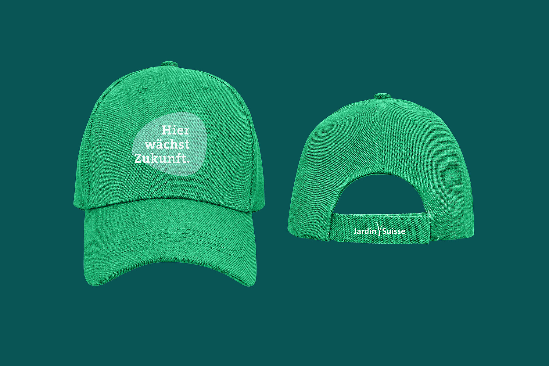 Eine grüne JardinSuisse-Baseballkappe mit dem Slogan «Hier wächst Zukunft»