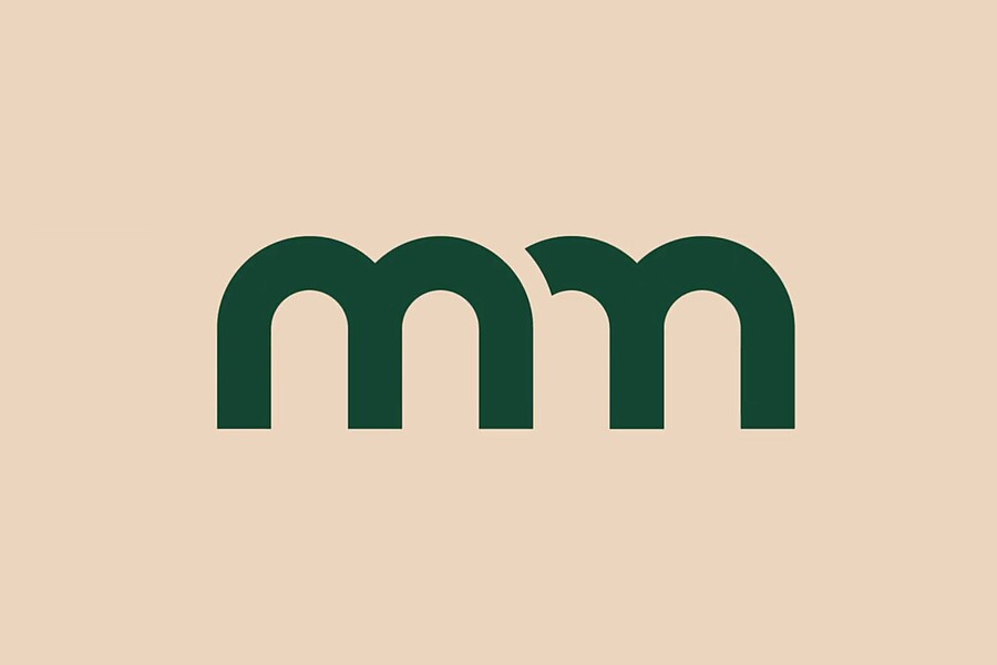 Das neue m&m-Gartenbau-Logo besteht aus zwei kleinen m, wobei das zweite vom ersten überschnitten wird.