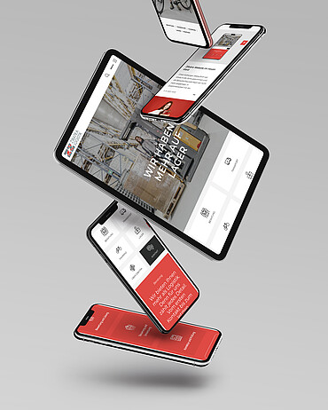 [Translate to Französisch:] Ein Tablet und mehrere Smartphones zeigen die von Stämpfli konzipierte Zibatra-Website.