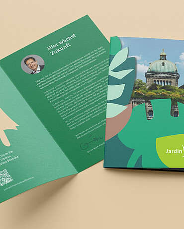 Eine spielerisch gestaltete Verbandsbroschüre: Das Titelbild zeigt ein begrüntes Bundeshaus mit der aufklappbaren Silhouette einer Pflanze im Vordergrund.